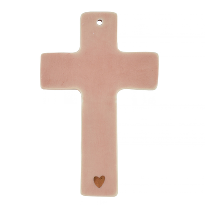 Croix murale en porcelaine rose – Cœur doré